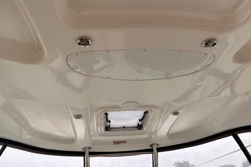 Slide: The Image of Ceiling view of 2007 Sea Ray 40 Sundancer boat with hatch and lighting fixtures. - 6
