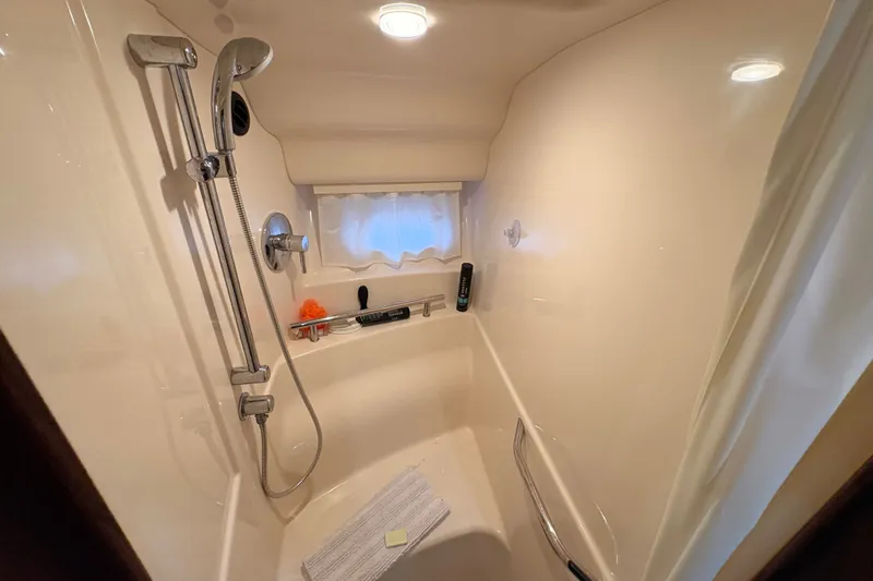 Slide: The Image of Luxurious shower in 2007 Sea Ray 40 Sundancer yacht, featuring modern fixtures and cozy design. - 26