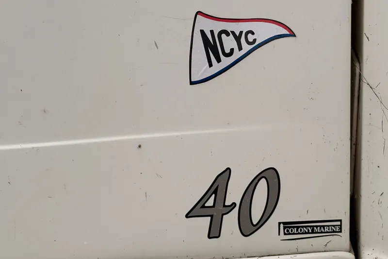 Slide: The Image of Sea Ray 40 Sundancer 2007 boat with NCYC and Colony Marine decals. - 7