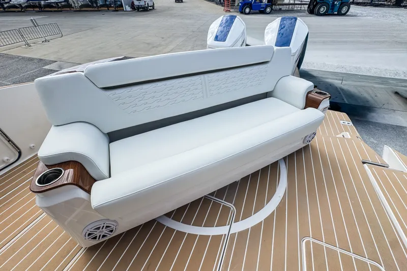 Slide: The Image of Luxurious seating on 2027 Tiara Yachts 39 LS, featuring elegant design and cup holders. - 30