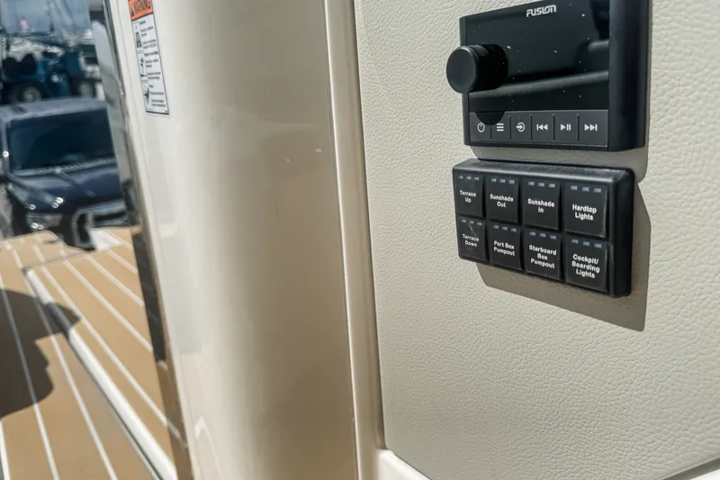 Slide: The Image of Control panel on 2027 Tiara Yachts 39 LS, featuring various function buttons. - 34