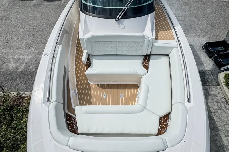 Slide: The Image of Luxurious seating area on 2027 Tiara Yachts 39 LS with elegant wood flooring. - 7
