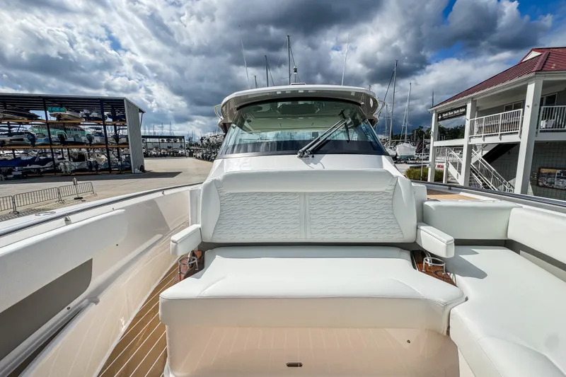 Slide: The Image of 2027 Tiara Yachts 39 LS luxury boat with sleek seating and modern design. - 11