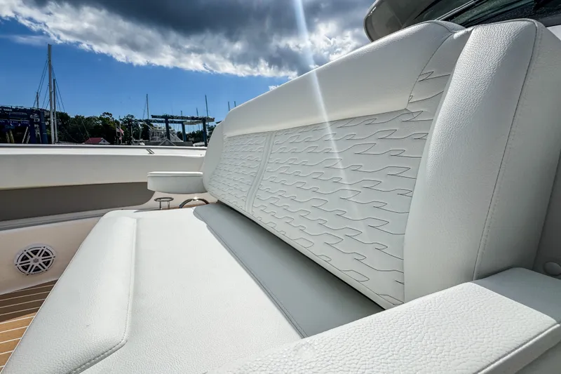 Slide: The Image of Luxurious seating on the 2027 Tiara Yachts 39 LS, featuring elegant white upholstery. - 14