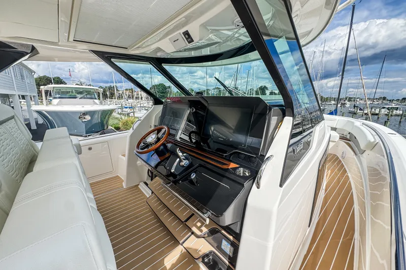 Slide: The Image of 2027 Tiara Yachts 39 LS cockpit with modern controls and luxurious seating. - 26