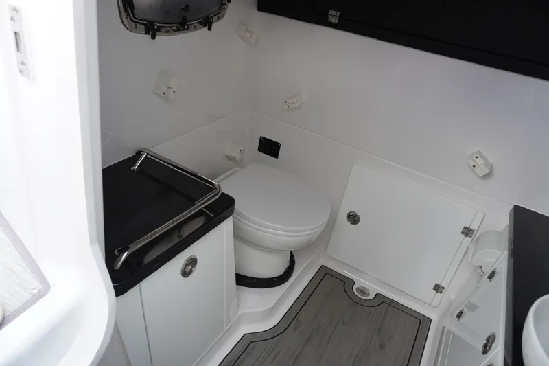 Slide: The Image of 2027 Monterey Elite 30 OB boat bathroom with modern fixtures and sleek design. - 26