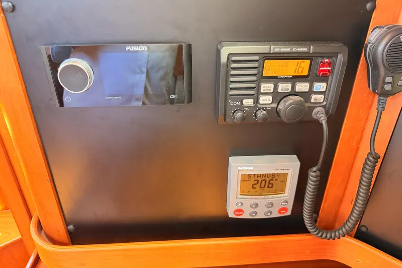 Slide: The Image of Control panel of a 2002 Sabre 362 yacht with radio and navigation equipment. - 70