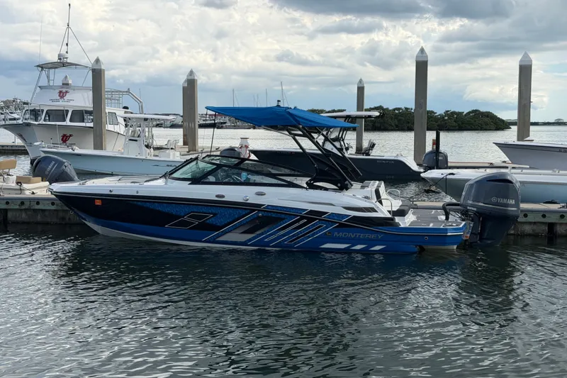 The Image of 2017 Monterey M-45 boat docked at marina with Yamaha engine, blue canopy. - 0