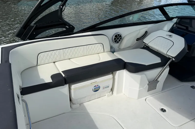 Slide: The Image of Luxury seating on a 2017 Monterey M-45 boat, featuring white and black upholstery. - 14