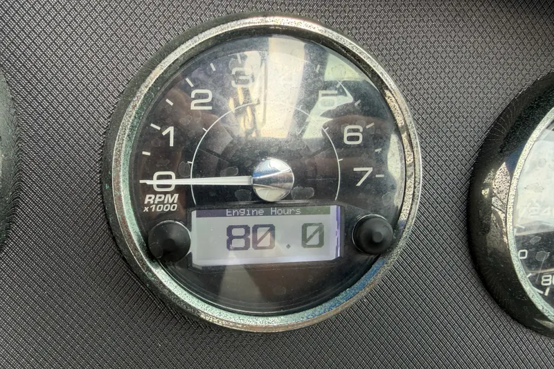 Slide: The Image of Close-up of a 2017 Monterey M-45 tachometer showing 80 engine hours. - 19