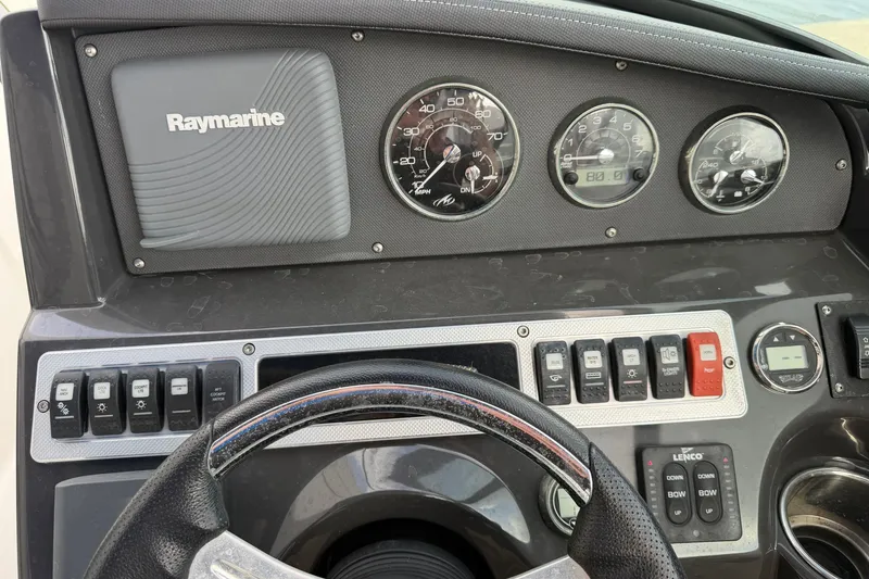 Slide: The Image of Dashboard of a 2017 Monterey M-45 boat with Raymarine navigation system. - 18