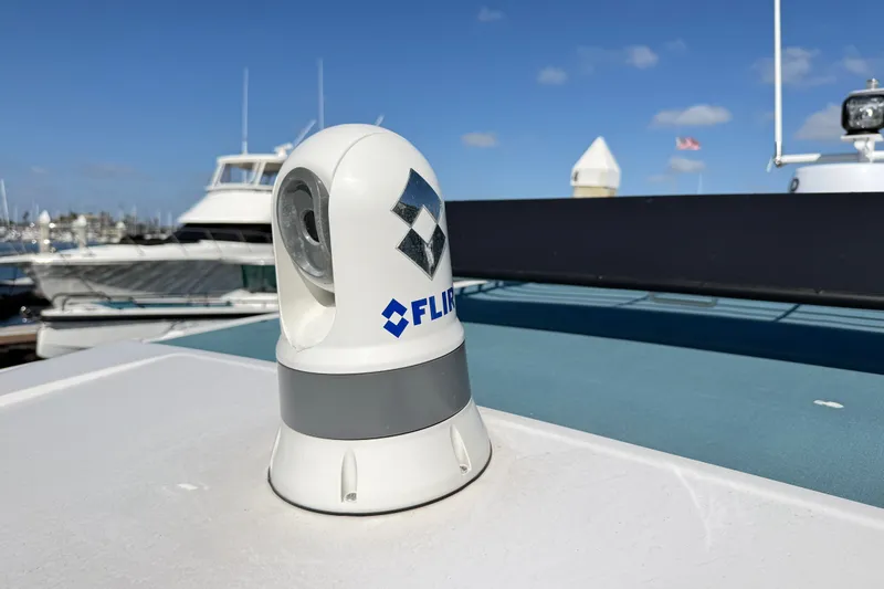 Slide: The Image of FLIR camera on 2024 Axopar 29 XC Cross Cabin boat, docked in marina. - 22