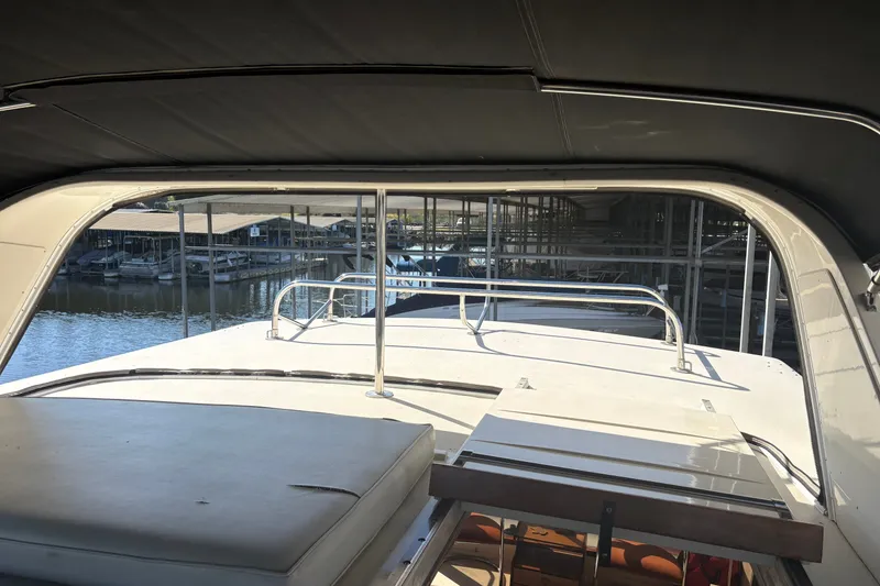 Slide: The Image of 1987 Californian 53 Cockpit Motor Yacht interior view at marina dock. - 18