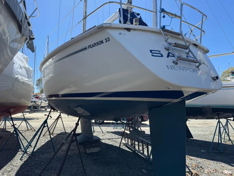 Slide: The Image of A 1988 Pearson 33-2 sailboat is on stands, ready for maintenance. - 49