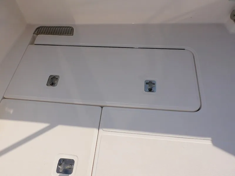Slide: The Image of The image shows the deck of a 2013 Tiara Yachts 3600 Open with hatches and fittings. - 49