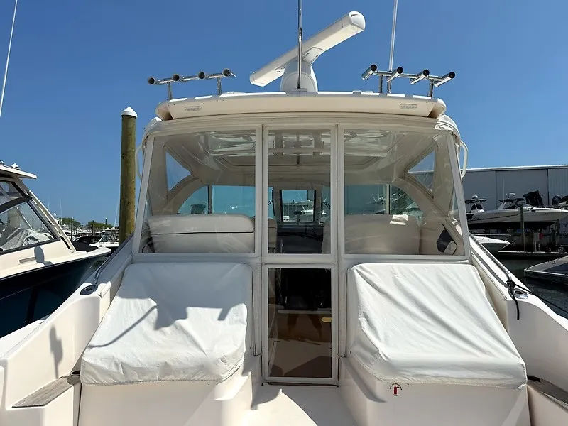 Slide: The Image of The 2013 Tiara Yachts 3600 Open features a spacious cockpit with white seat covers. - 4