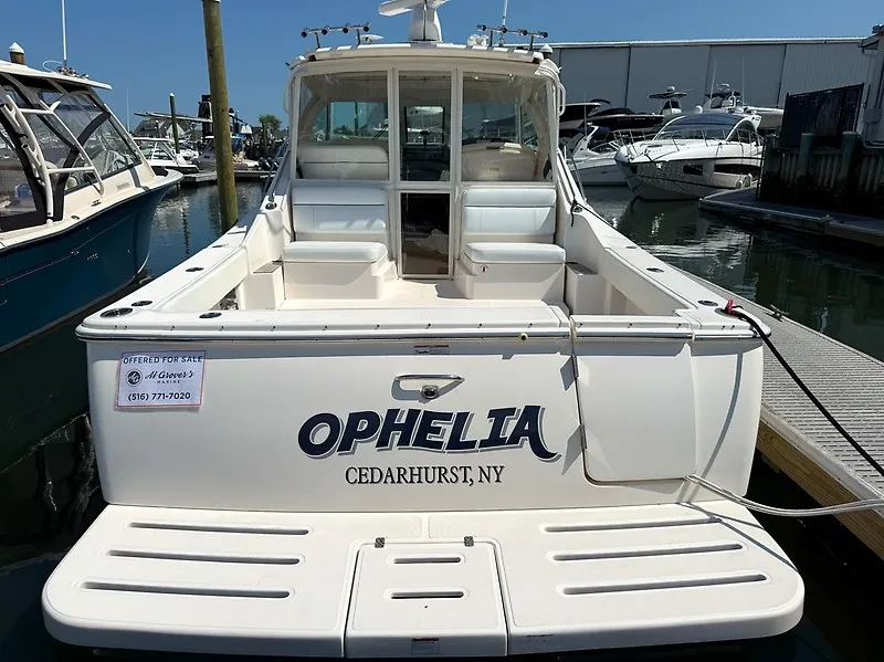 Slide: The Image of A 2013 Tiara Yachts 3600 Open named "Ophelia" docked in Cedarhurst, NY. - 2