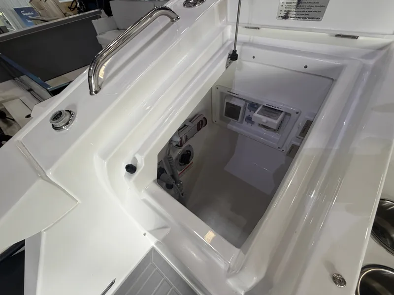 Slide: The Image of A view into the storage compartment of a 2027 Cruisers Yachts 38 GLS. - 40