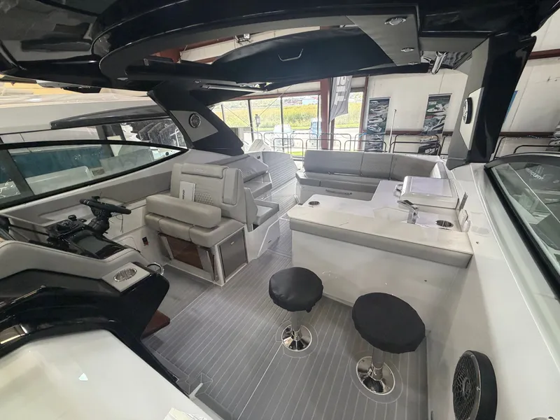 Slide: The Image of Interior of a modern yacht with seating area and bar stools. - 21