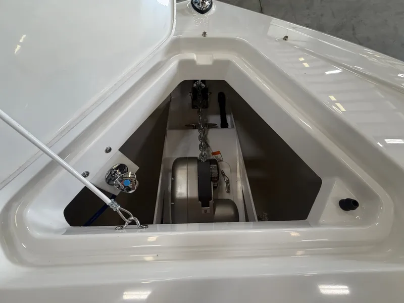 Slide: The Image of Anchor locker of a 2027 Cruisers Yachts 38 GLS with chain and winch. - 22