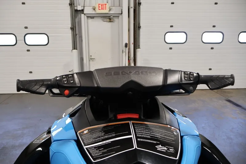 Slide: The Image of 2017 Sea-Doo RXT 260 handlebars in a garage setting. - 8
