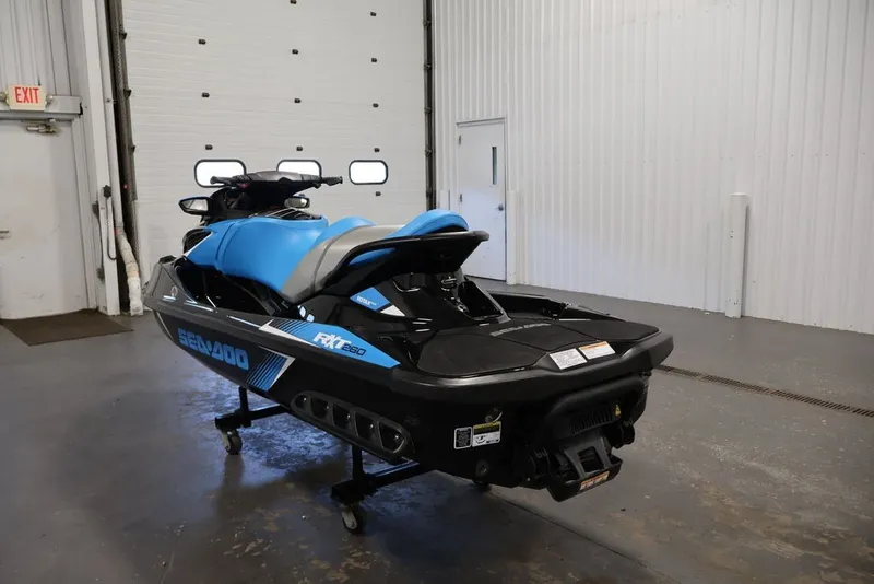 Slide: The Image of 2017 Sea-Doo RXT 260 jet ski in a garage setting. - 11