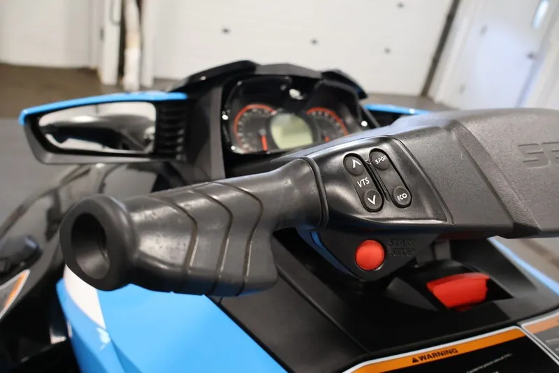 Slide: The Image of 2017 Sea-Doo RXT 260 handlebar controls with VTS and ECO buttons. - 13