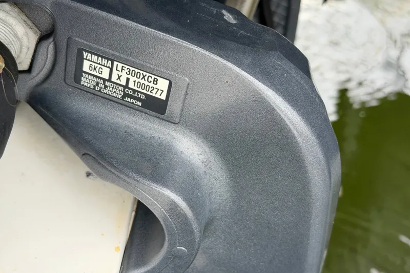 Slide: The Image of Yamaha LF300XCB engine on 2007 Intrepid 327 Cuddy boat, close-up view. - 20