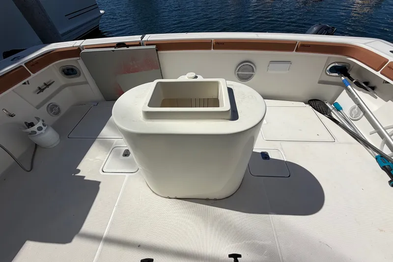 Slide: The Image of Cockpit of 2000 Tiara Yachts 4300 Convertible with fishing gear and storage. - 36