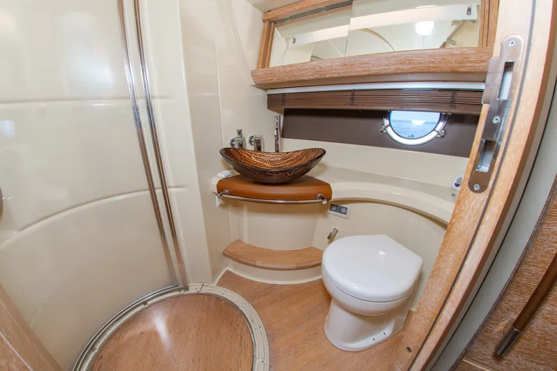 Slide: The Image of The image shows an elegant bathroom on a 2008 Azimut 47 yacht. - 32