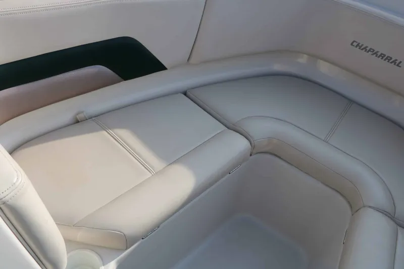 Slide: The Image of The image shows the cushioned seating area of a 1997 Chaparral 2130 Sport Limited boat. - 17