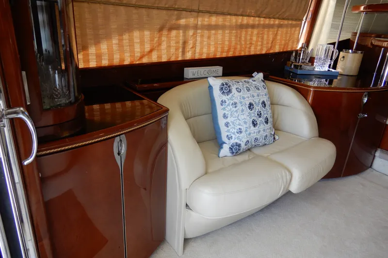 Slide: The Image of Luxurious interior of 2008 Viking Sport Cruisers 61 Motor Yacht with elegant seating. - 61