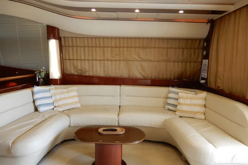 Slide: The Image of Luxurious interior of 2008 Viking Sport Cruisers 61 Motor Yacht with plush seating and cushions. - 53