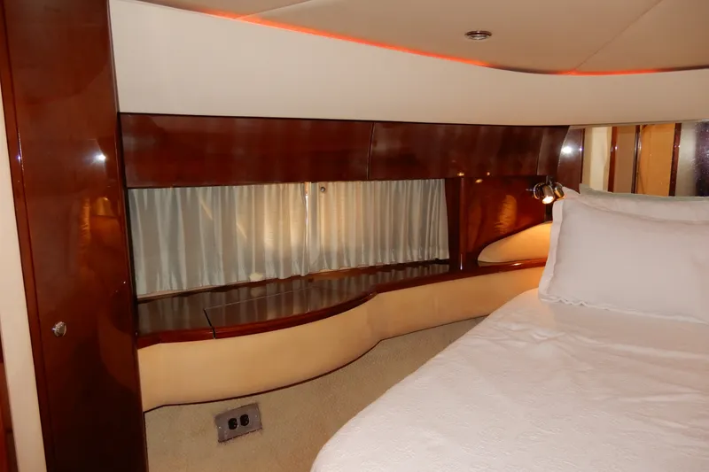 Slide: The Image of Luxurious cabin interior of 2008 Viking Sport Cruisers 61 Motor Yacht with elegant wood finish. - 103