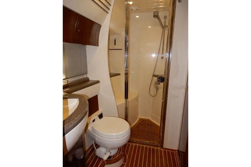 Slide: The Image of Luxurious bathroom in 2008 Viking Sport Cruisers 61 Motor Yacht with shower and modern fixtures. - 94