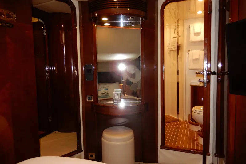 Slide: The Image of Luxurious interior of 2008 Viking Sport Cruisers 61 Motor Yacht with elegant wood finishes. - 116
