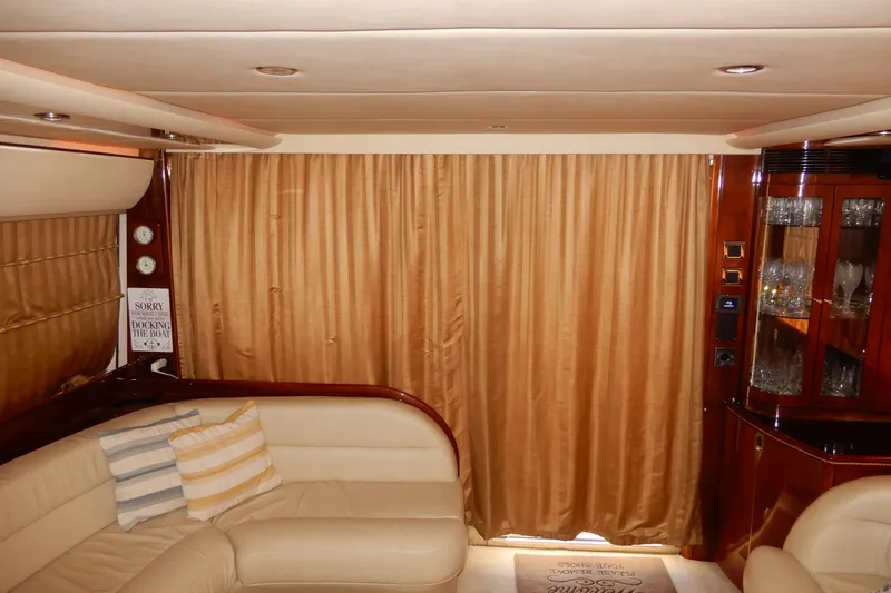 Slide: The Image of Luxurious interior of 2008 Viking Sport Cruisers 61 Motor Yacht with elegant furnishings. - 58