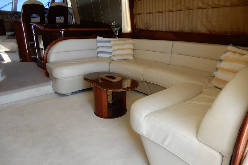 Slide: The Image of Luxurious interior of 2008 Viking Sport Cruisers 61 Motor Yacht with plush seating and elegant decor. - 52