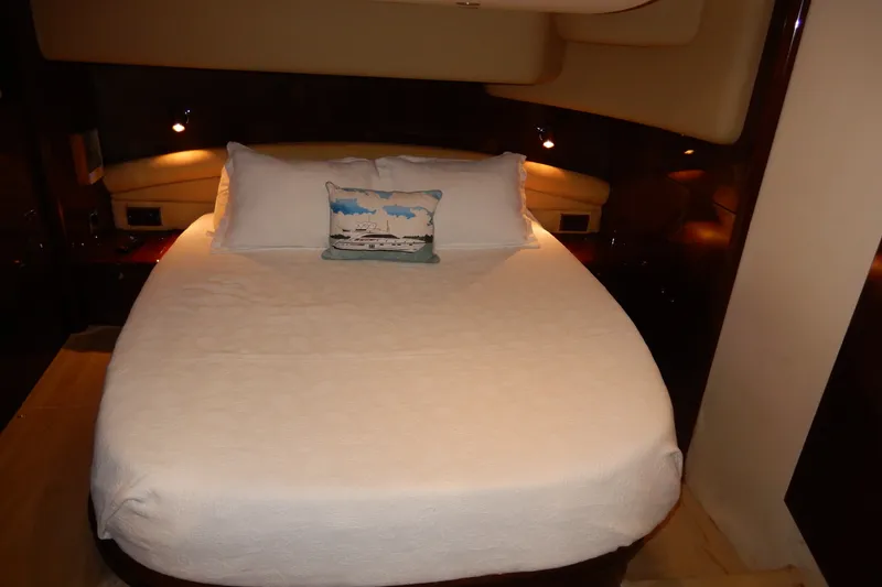 Slide: The Image of Luxurious bedroom interior of 2008 Viking Sport Cruisers 61 Motor Yacht with elegant bedding. - 111