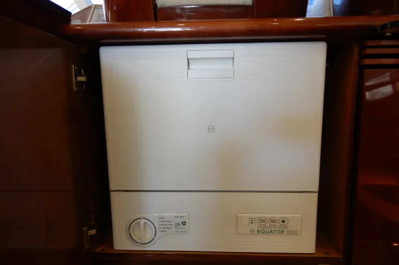 Slide: The Image of Equator washing machine inside 2008 Viking Sport Cruisers 61 Motor Yacht cabinet. - 75