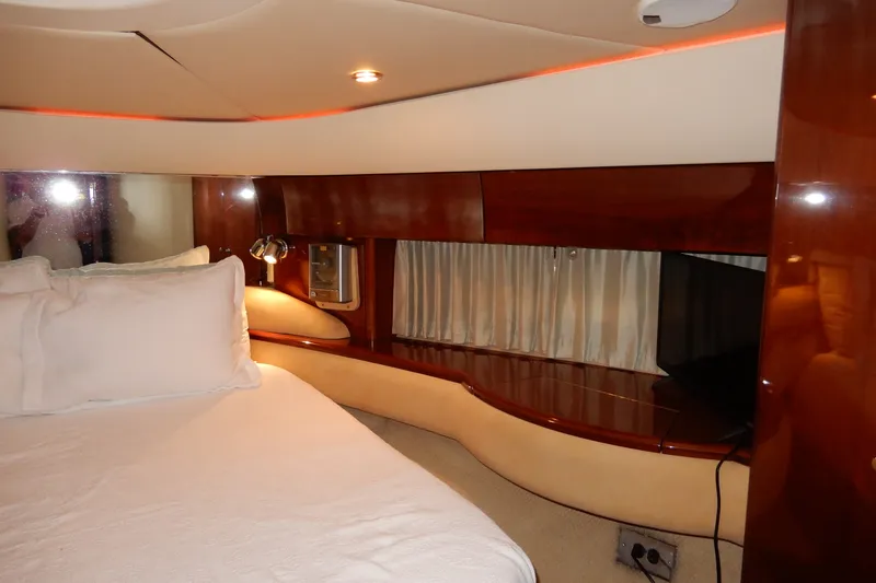 Slide: The Image of Luxurious bedroom interior of 2008 Viking Sport Cruisers 61 Motor Yacht. - 104