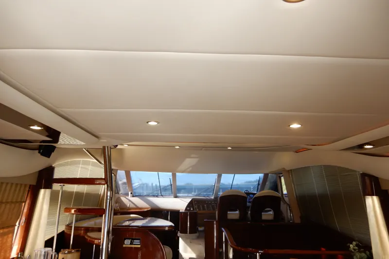 Slide: The Image of Luxurious interior of a 2008 Viking Sport Cruisers 61 Motor Yacht with elegant seating. - 51