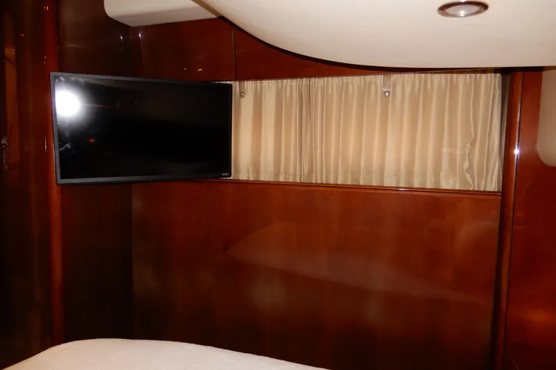 Slide: The Image of Interior of 2008 Viking Sport Cruisers 61 Motor Yacht with TV and curtains. - 114
