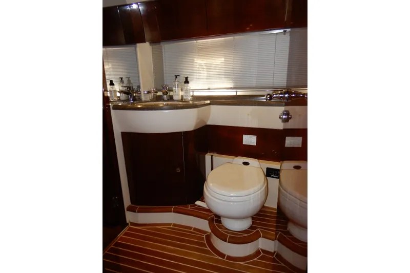 Slide: The Image of Luxurious bathroom in 2008 Viking Sport Cruisers 61 Motor Yacht with modern fixtures. - 95