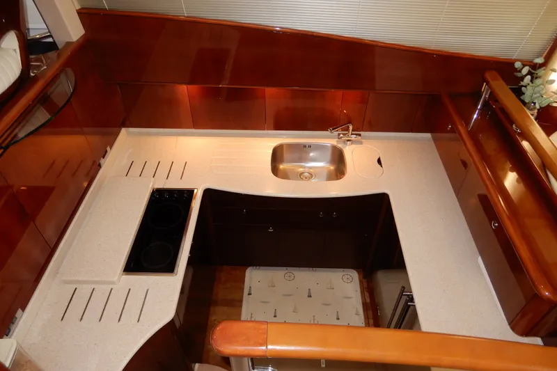 Slide: The Image of Luxurious kitchen area in 2008 Viking Sport Cruisers 61 Motor Yacht. - 70