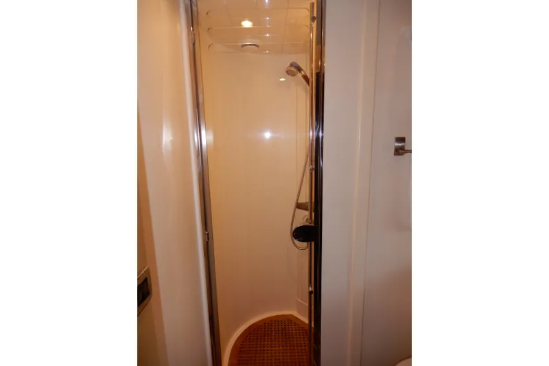 Slide: The Image of Shower area in 2008 Viking Sport Cruisers 61 Motor Yacht, featuring sleek design and modern fixtures. - 107