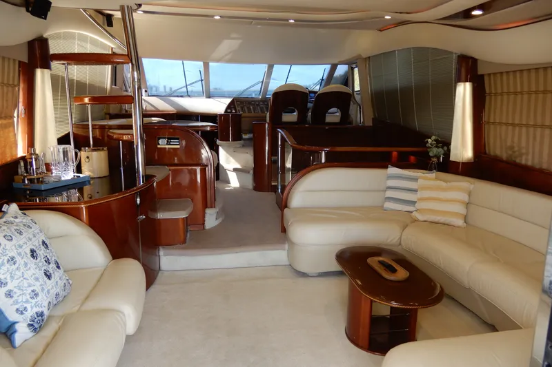 Slide: The Image of Luxurious interior of 2008 Viking Sport Cruisers 61 Motor Yacht with elegant seating and decor. - 50