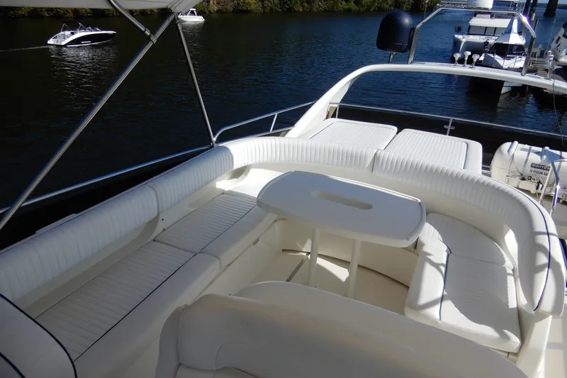 Slide: The Image of Luxurious seating area on a 2008 Viking Sport Cruisers 61 Motor Yacht. - 28