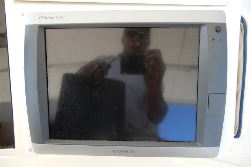 Slide: The Image of Garmin GPSmap 5212 on 2008 Viking Sport Cruisers 61 Motor Yacht dashboard. - 45
