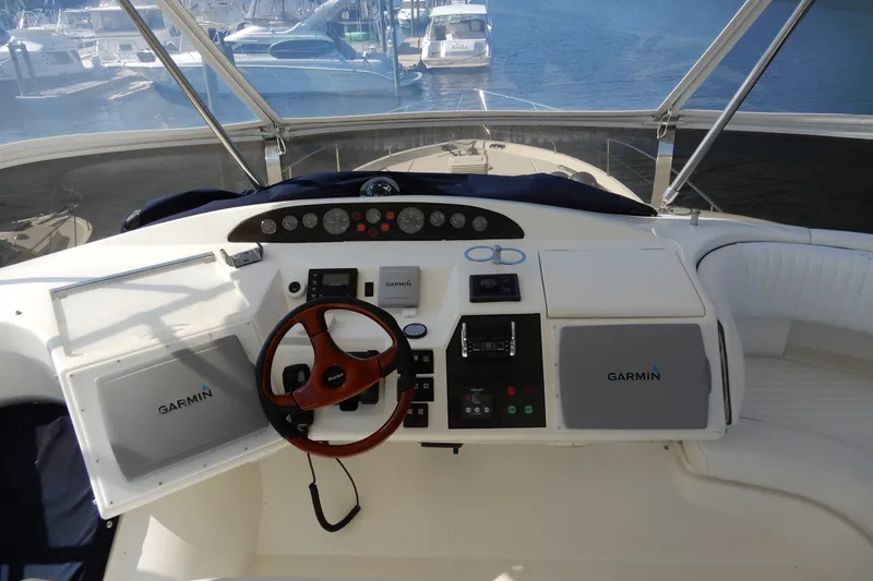 Slide: The Image of Helm of 2008 Viking Sport Cruisers 61 Motor Yacht with Garmin navigation system. - 43